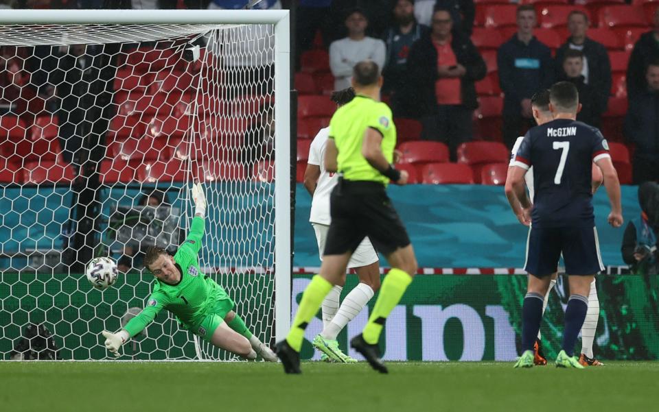 Jordan Pickford of England makes a save from a shot from Stephen O'Donnell (Not pictured) of Scotland during the UEFA Euro 2020 Championship Group D match between England and Scotland at Wembley Stadium on June 18, 2021 in London - GETTY IMAGES