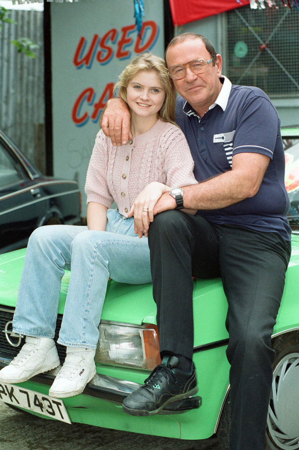 The cast of EastEnders on set. Daniella Westbrook as Sam Mitchell and Mike Reid as Frank Butcher, 28th June 1991. (Photo by Nigel Wright/Mirrorpix/Getty Images)