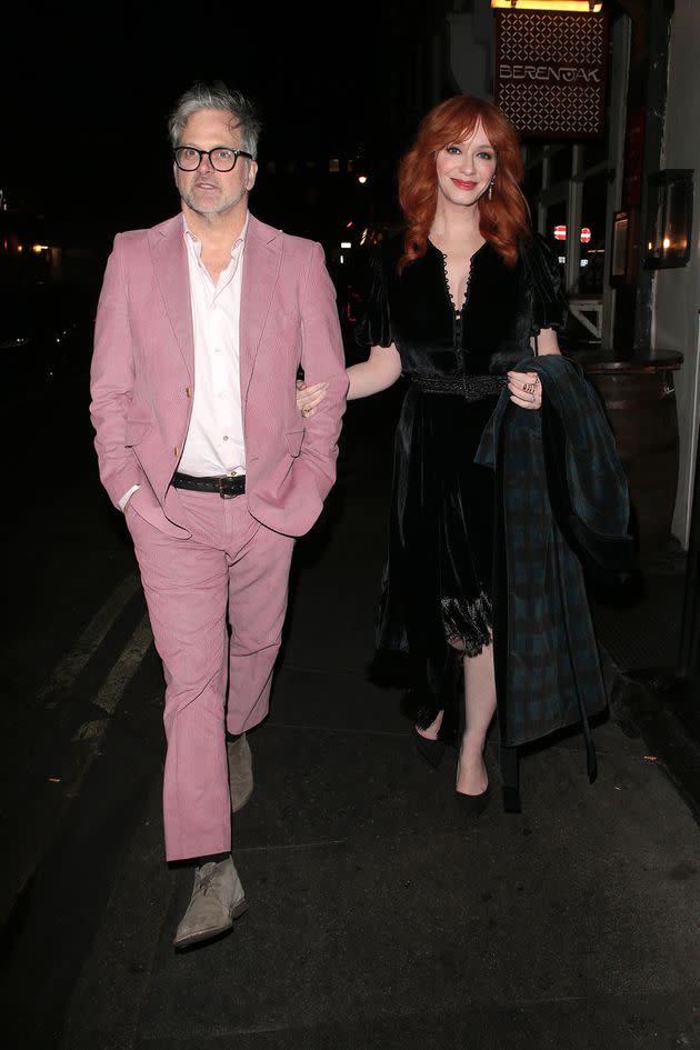 George Bianchini and Christina Hendricks attend a celebration following the British Academy Film Awards on Feb. 19 in London.