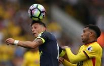 Football Soccer Britain - Watford v Arsenal - Premier League - Vicarage Road - 27/8/16 Arsenal's Mesut Ozil in action with Watford's Etienne Capoue Action Images via Reuters / Andrew Boyers Livepic