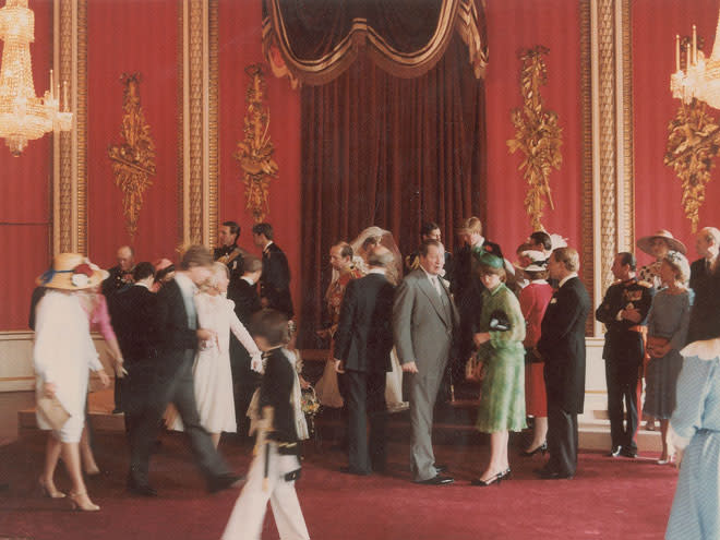 <p>Both the Spencer and Windsor-Mountbatten family fill the Buckingham Palace throne room before the staged portraits are shot.</p>