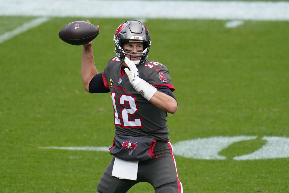 Tampa Bay Buccaneers quarterback Tom Brady throws a pass during the first half of an NFL football game against the Denver Broncos, Sunday, Sept. 27, 2020, in Denver. (AP Photo/Jack Dempsey)