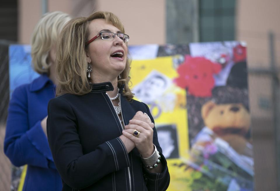 Former Rep. Gabrielle Giffords sings National Anthem at dedication for the January 8th Memorial at El Presidio Park in Tucson, Ariz., on Jan. 8, 2018.