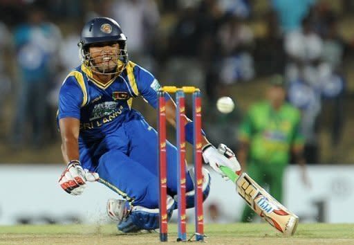 Sri Lankan batsman Dinesh Chandimal dives during the first Twenty20 match between Sri Lanka and Pakistan at the Suriyawewa Mahinda Rajapakse stadium in the southern district of Hambantota. Sri Lanka defeated Pakistan by 37 runs in the opening Twenty20 international in Hambantota