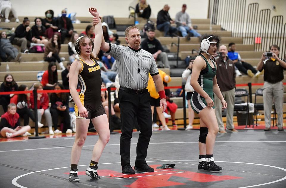 Delran's Kalli Roskos defeated Mainland's Jackeline Oviedo 9-2 following Saturday's 120 lb. bout at the NJSIAA 2022 South Region girls' wrestling tournament held at Kingsway High School. Feb. 12, 2022.