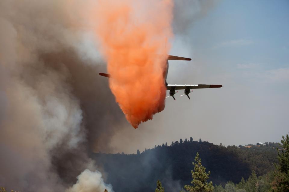 An air tanker drops retardant on the "Sand Fire" near Plymouth, California