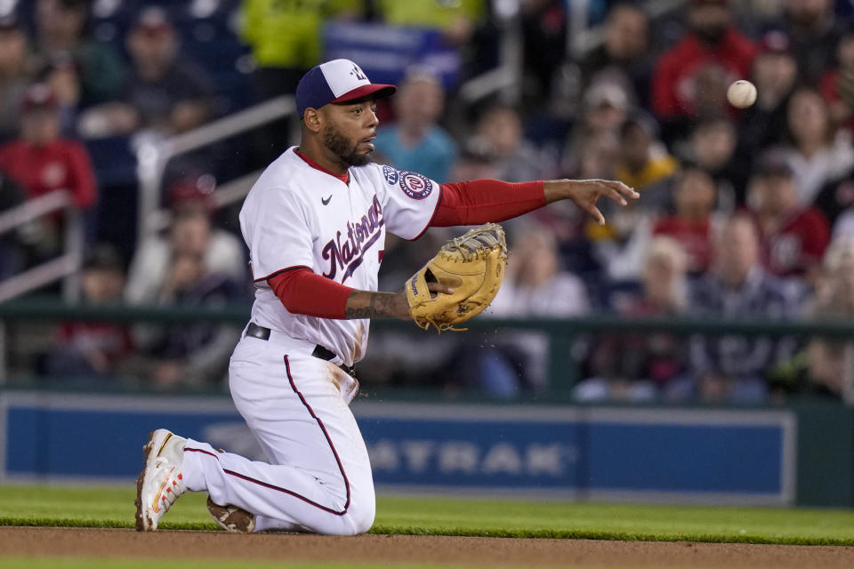 Washington Nationals first baseman Dominic Smith throws out Tampa Bay Rays' Francisco Mejia during the fourth inning of a baseball game at Nationals Park, Monday, April 3, 2023, in Washington.(AP Photo/Alex Brandon)