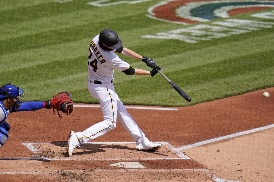 Pittsburgh Pirates starting pitcher JT Brubaker drives in two runs with a single off Chicago Cubs starting pitcher Trevor Williams during the second inning of a baseball game in Pittsburgh, Sunday, April 11, 2021. (AP Photo/Gene J. Puskar)