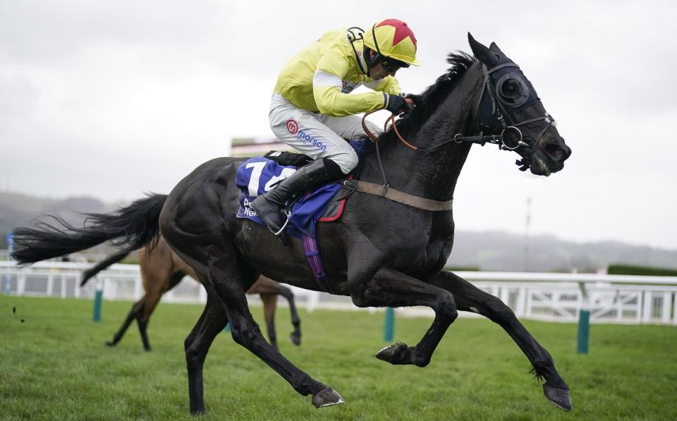 Harry Cobden riding Monmiral (yellow) clear the last to win The Pertemps Network Final Handicap Hurdle during day three