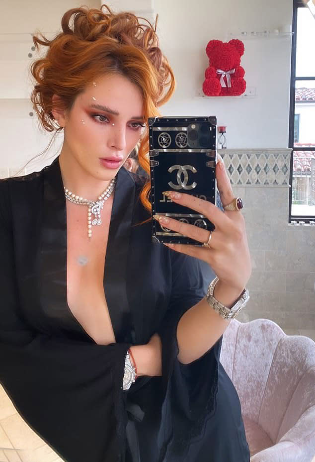 Bella thorne in black silk robe, naked snap