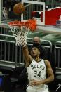 Milwaukee Bucks' Giannis Antetokounmpo shoots during the first half of an NBA basketball game against the Toronto Raptors Tuesday, Feb. 16, 2021, in Milwaukee. (AP Photo/Morry Gash)