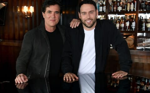 Scott Borchetta and Scooter Braun pose for a photo at a private residence in Montecito, California - Credit: Getty