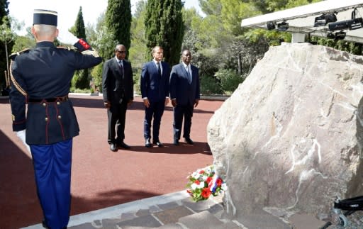 (LtoR) The leaders of Guinea, France and Ivory Coast attend a ceremony marking the 75th anniversary of the Allied landings in Provence during World War II on Thursday