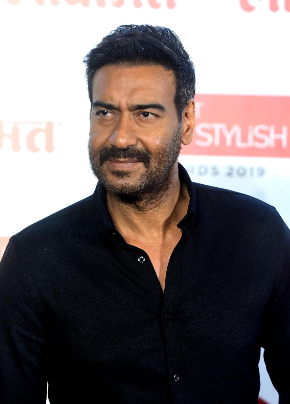 In this picture taken on December 18, 2019 Bollywood actor Ajay Devgn arrives at the Lokmat Most Stylish Awards in Mumbai. (Photo by Sujit Jaiswal / AFP) (Photo by SUJIT JAISWAL/AFP via Getty Images)