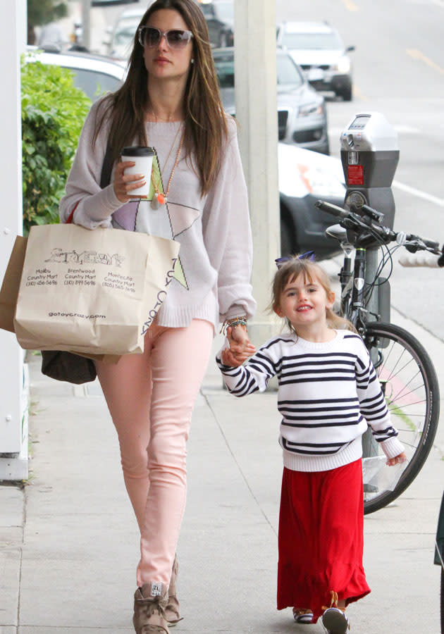Celebrities in pastel fashion: Alessandra Ambrosio teamed her pastel pink jeans with a loose jumper in LA.<br><br>© Rex