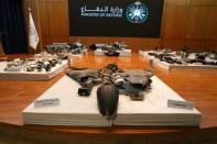 Remains of the missiles which Saudi government says were used to attack an Aramco oil facility, are displayed during a news conference in Riyadh