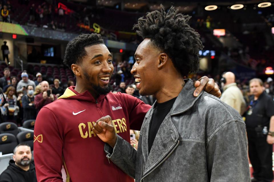 Cleveland Cavaliers guard Donovan Mitchell talks with Utah Jazz guard Collin Sexton after the Cavaliers defeated the Jazz 122-99 on Dec. 19.