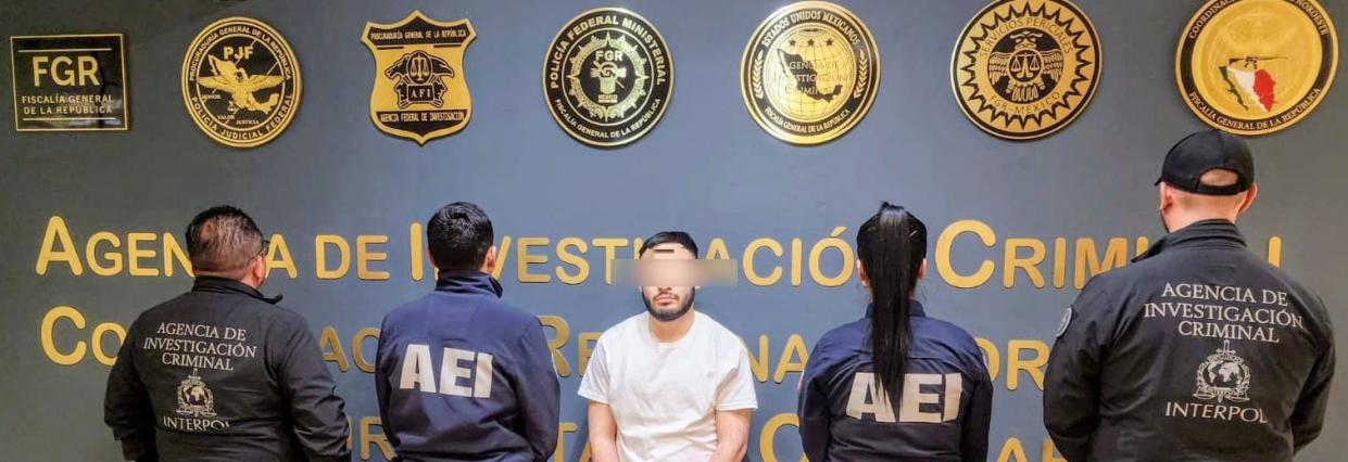 Former Fort Bliss soldier Saul Luna Villa, who is accused of killing a woman in Juárez on April 7, 2023, is posed with Chihuahua State Investigations Agency and Interpol agents following his extradition to Mexico on Feb. 20, 2024.