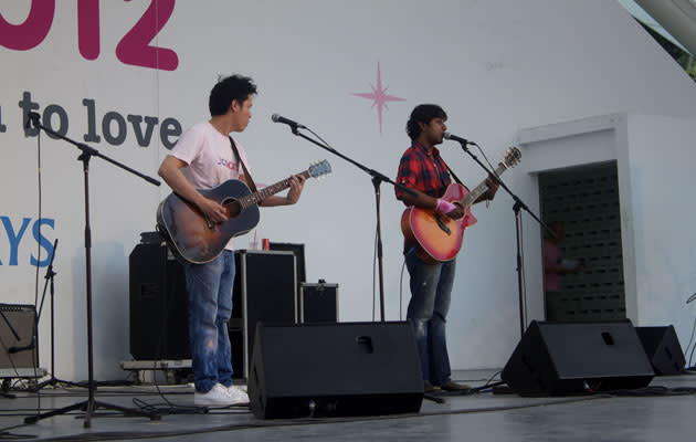 Music-duo, Jack and Rai, kicking off the concert with two acoustic pieces. They even performed their own original song, "Take Me As I Am", which was the theme song of popular local drama, "Red Thread". (Yahoo! photo/Melissa Law)