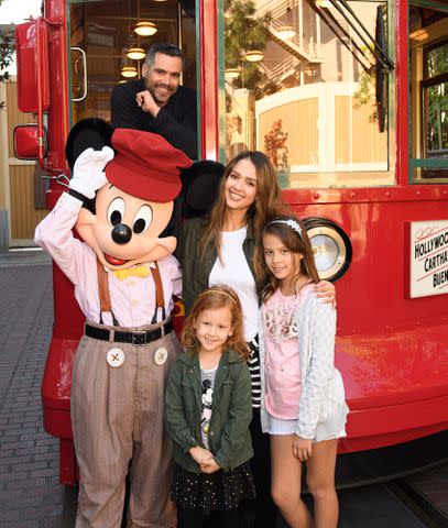 Richard Harbaugh/Disneyland Resort Jessica Alba, Cash Warren, their children and Mickey Mouse