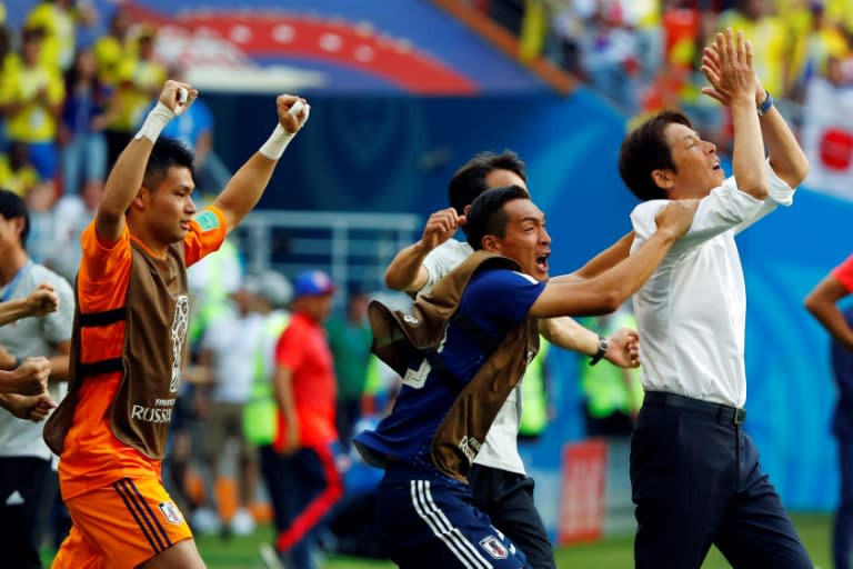 Japan celebrate their 2-1 win against Colombia in their World Cup opener in Russia