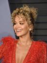 <p>Rita Ora's messy updo is a lesson in using your curly texture to your advantage. An updo with cascading curls and face-framing tendrils will always feel romantic and youthful, while also looking polished.</p>