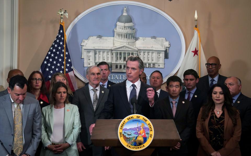 Flanked by lawmakers from both houses of the state legislature, Newsom said he is ready to sign more restrictive gun measures passed by lawmakers.