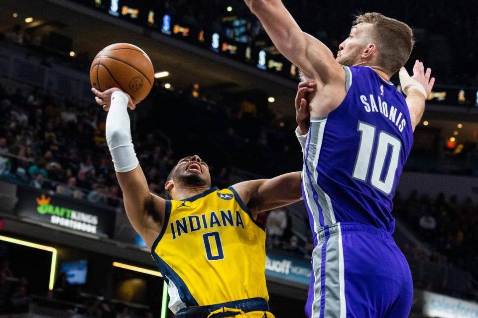 Indiana Pacers guard Tyrese Haliburton (0) shoots the ball while Sacramento Kings center Domantas Sabonis (10) defends in the second quarter Feb. 3, 2023, at Gainbridge Fieldhouse in Indianapolis, Indiana.