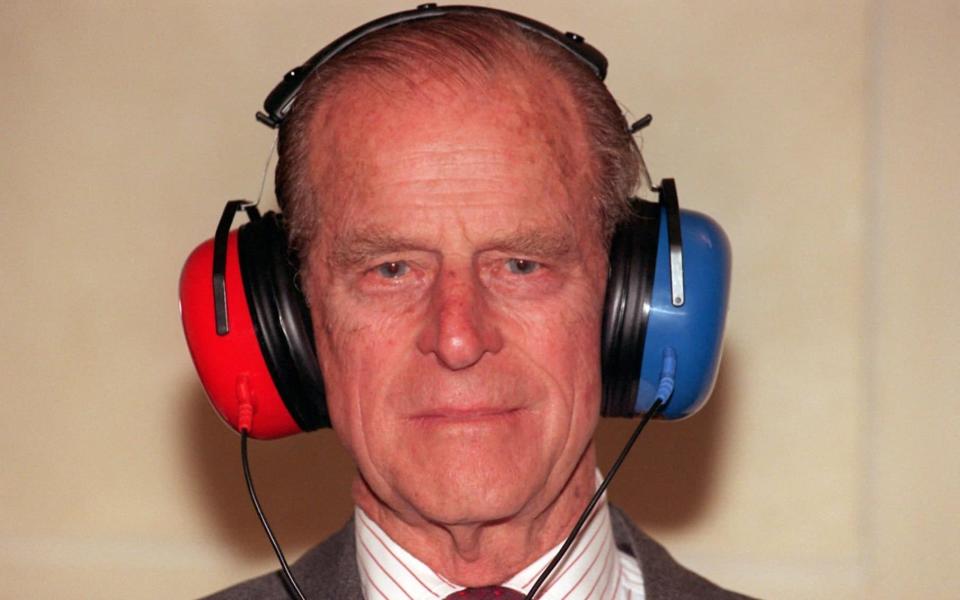 The Duke of Edinburgh tries the facilities at the Royal National Institute for Deaf People during a visit in 1998 - Credit: PA