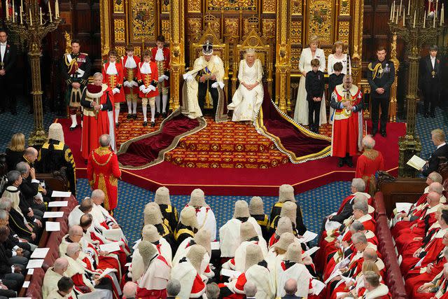 <p>KIRSTY WIGGLESWORTH/POOL/AFP via Getty Images</p> King Charles and Queen Camilla attend the State Opening of Parliament on Nov. 7, 2023