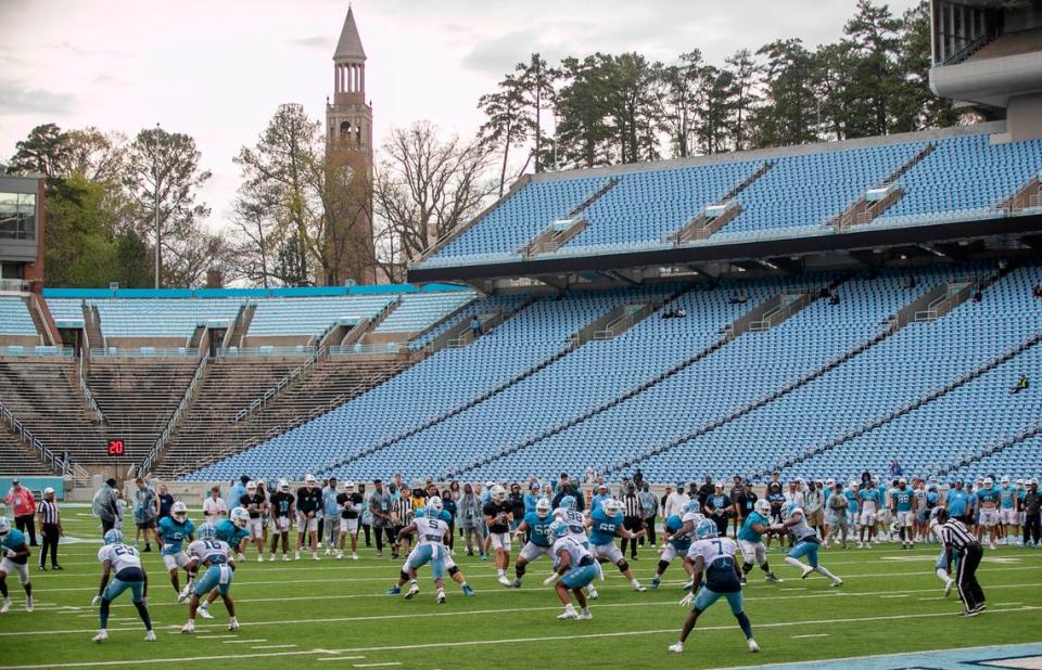 North Carolina quarterback Drake Maye (10) runs the offense during a scrimmage at the Tar Heels’ open practice on Saturday, March 25, 2023 at Kenan Stadium in Chapel Hill. N.C.