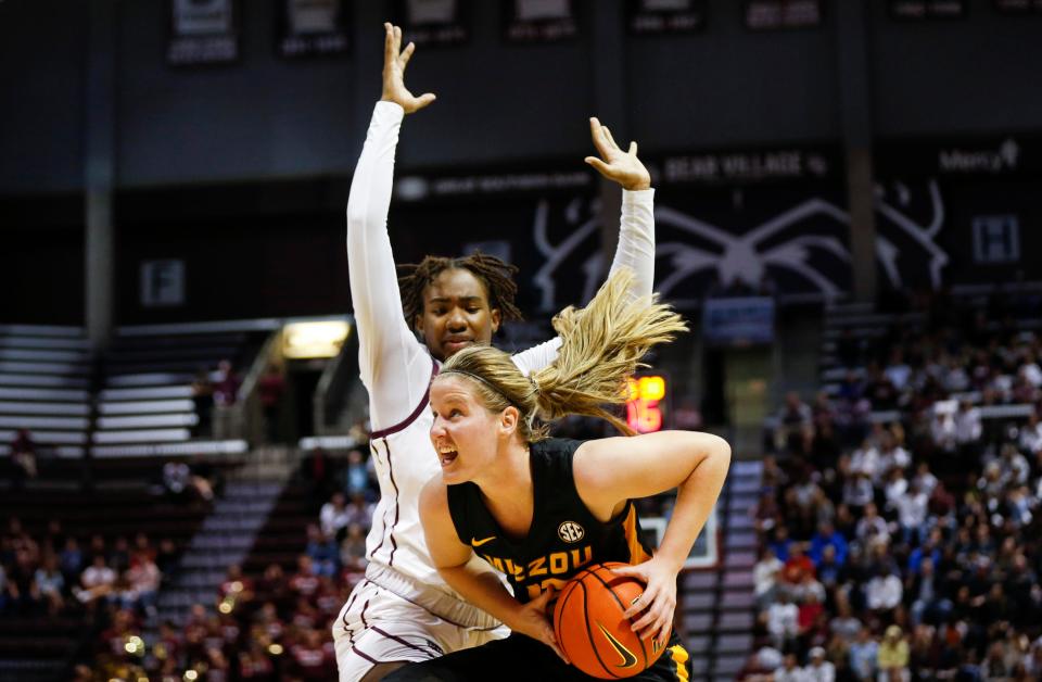 Mizzou's Hayley Frank looks to the basket as she drives around MSU's forward Kennedy Taylor during a game at GSB Arena on Monday, Nov. 7, 2022.