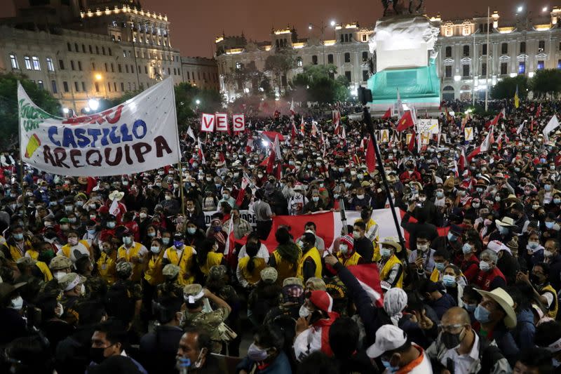 Supporters of socialist Pedro Castillo and right-wing Keiko Fujimori march demanding victory for their respective candidates, in Lima