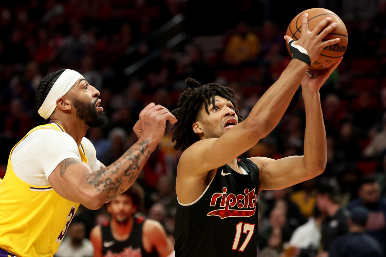 Anthony Davis #3 of the Los Angeles Lakers defends Shaedon Sharpe #17 of the Portland Trail Blazers. (Photo by Steph Chambers/Getty Images)