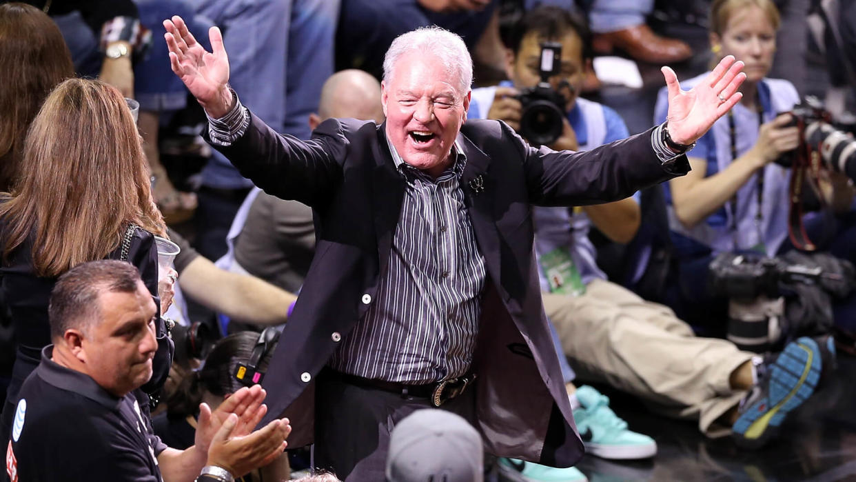 SAN ANTONIO, TX - JUNE 11:  CEO Peter Holt of the San Antonio Spurs cheers on the team in the second half while taking on the Miami Heat during Game Three of the 2013 NBA Finals at the AT&T Center on June 11, 2013 in San Antonio, Texas.