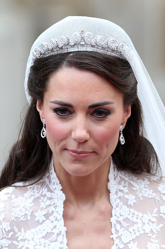 kate middleton wears cartier tiara, LONDON, ENGLAND - APRIL 29:  Catherine, Duchess of Cambridge smiles following her marriage to Prince William, Duke of Cambridge at Westminster Abbey on April 29, 2011 in London, England. The marriage of the second in line to the British throne was led by the Archbishop of Canterbury and was attended by 1900 guests, including foreign Royal family members and heads of state. Thousands of well-wishers from around the world have also flocked to London to witness the spectacle and pageantry of the Royal Wedding.  (Photo by Chris Jackson/Getty Images)