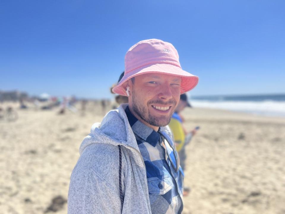 Paviel Marakhovskyi of Ukraine watched his friends’ surfing heats in Huntington Beach, Calif., Sept. 19, 2022.