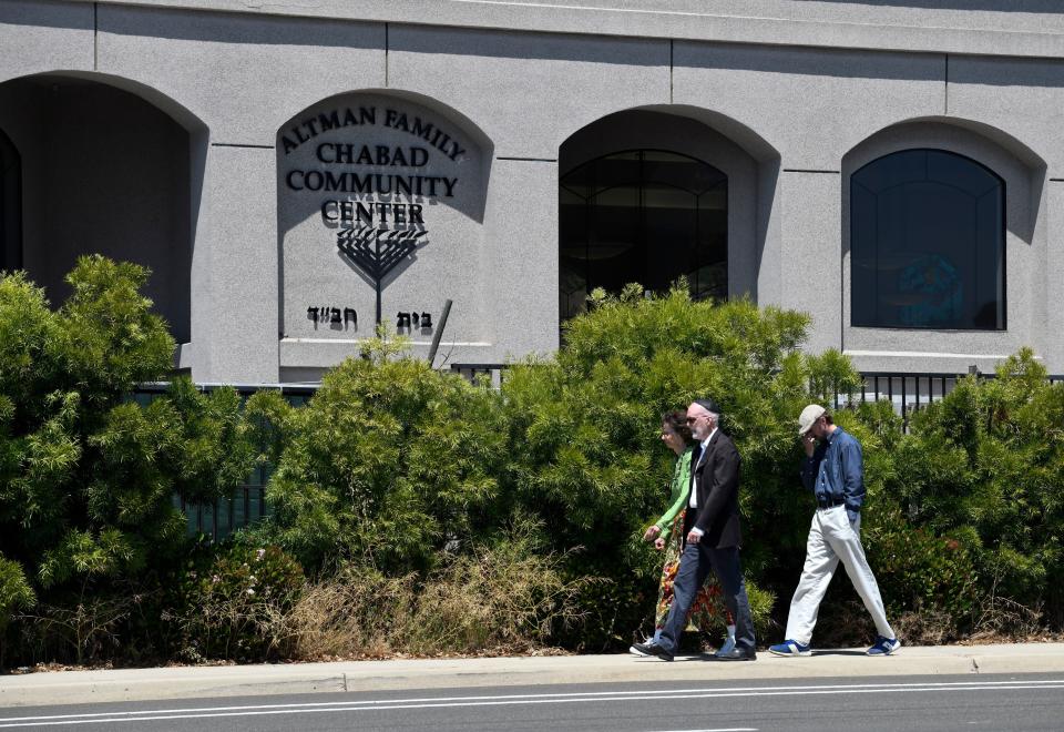 Officials are still investigating a Passover shooting at a California synagogue that left one dead and three injured.