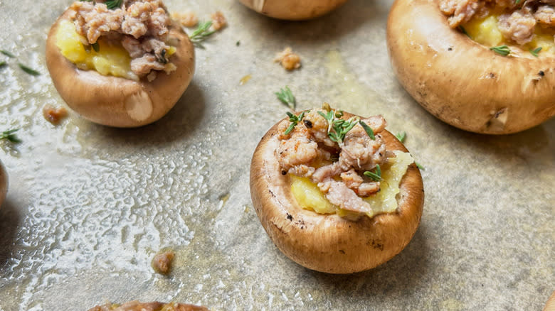 thyme on sausage stuffed mushrooms