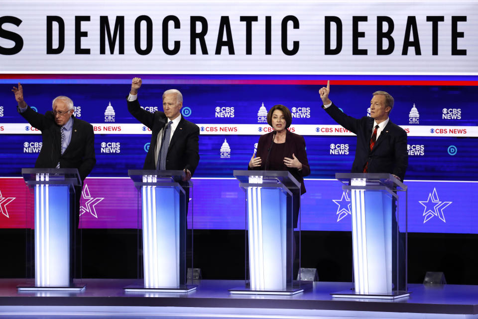 From left, Democratic presidential candidates, Sen. Bernie Sanders, I-Vt., former Vice President Joe Biden, Sen. Amy Klobuchar, D-Minn., and businessman Tom Steyer participate in a Democratic presidential primary debate at the Gaillard Center, Tuesday, Feb. 25, 2020, in Charleston, S.C., co-hosted by CBS News and the Congressional Black Caucus Institute. (AP Photo/Patrick Semansky)