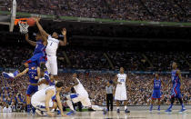 Thomas Robinson #0 of the Kansas Jayhawks goes up for a shot against Darius Miller #1 of the Kentucky Wildcats in the first half in the National Championship Game of the 2012 NCAA Division I Men's Basketball Tournament at the Mercedes-Benz Superdome on April 2, 2012 in New Orleans, Louisiana. (Photo by Ronald Martinez/Getty Images)