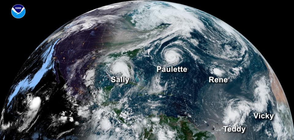 A satellite image from Sept. 14, 2020, shows five tropical systems spinning in the Atlantic basin at one time. From left, Hurricane Sally in the Gulf of Mexico, Hurricane Paulette east of the Carolinas, the remnants of Tropical Storm Rene in the central Atlantic and Tropical Storms Teddy and Vicky in the eastern Atlantic. A total of 10 named storms formed in September, the most for any month on record.