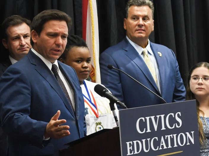 Florida Governor Ron DeSantis speaks at a press conference to discuss Florida's civics education initiative at Crooms Academy of Information Technology in Sanford.