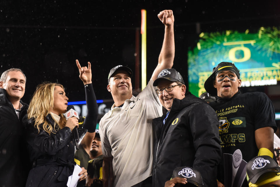 Oregon will have to settle for the Rose Bowl after winning the Pac-12 because of two regular-season losses. (Cody Glenn/Icon Sports/Getty Images)