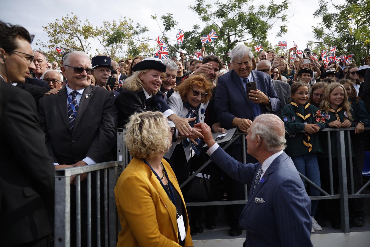 King Charles greets fans after remembrance ceremony at the Arc de Triomphe (EPA)