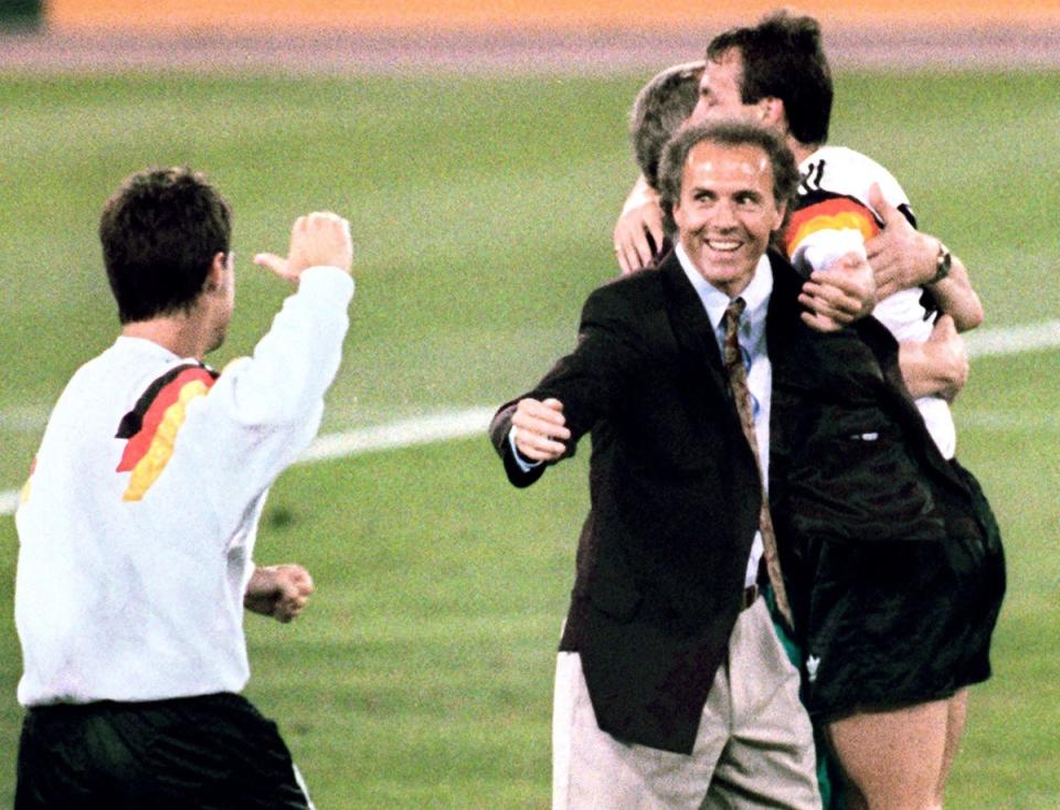 Germany head coach Franz Beckenbauer celebrates beating defending champions Argentina 1-0  in the World Cup final in 1990 (AFP via Getty Images)