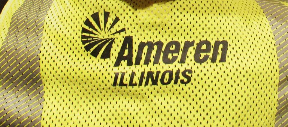 An Ameren Illinois logo is seen on the back of a workers' shirt in a file photo.