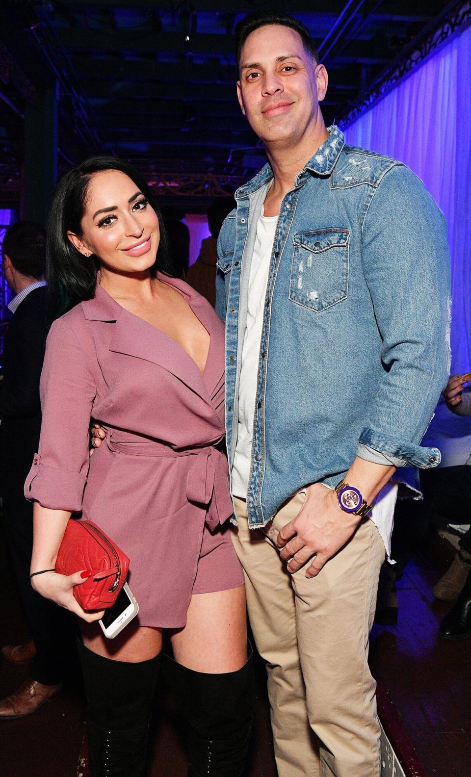 Angelina Pivarnick and Chris Larangeira attend WEtv's premiere fashion event celebrating the return of 'Bridezillas'