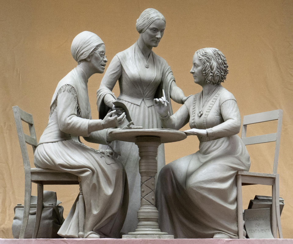 This Oct. 6, 2019 photo provided by Michael Bergmann shows a one-third scale clay model of Sojourner Truth, left, Susan B. Anthony, center, and Elizabeth Cady Stanton at Meredith Bergmann's studio in Ridgefield, Conn. A New York City commission voted Monday, Oct. 21 to erect a tribute to the three civil rights pioneers. Meredith Bergmann's work is to be dedicated next August in Central Park, marking the 100th anniversary of women's suffrage in the United States. (Michael Bergmann via AP)