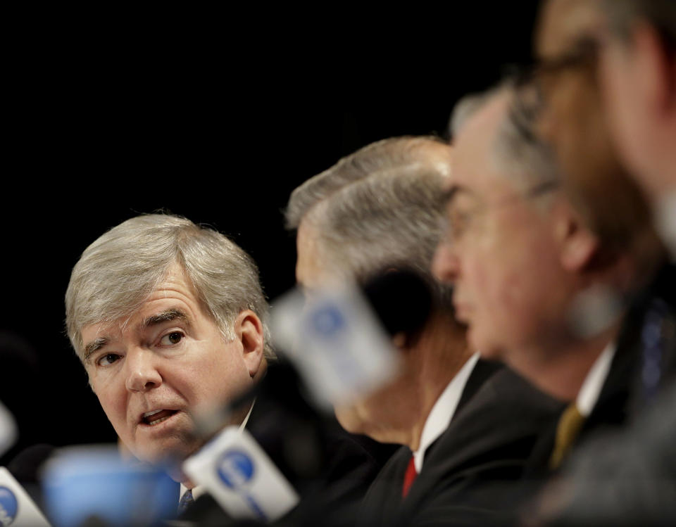 NCAA President Mark Emmert answers a question at a news conference Sunday, April 6, 2014, in Arlington, Texas. (AP Photo/Tony Gutierrez)